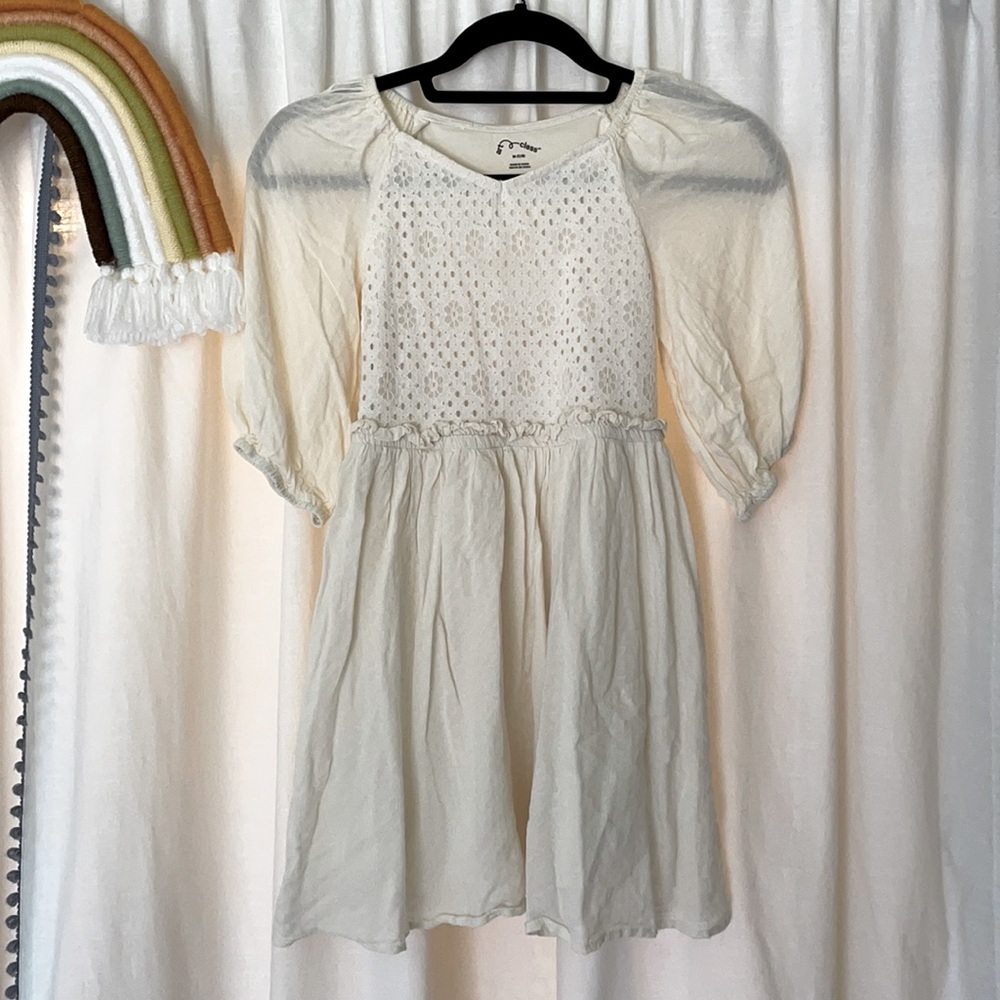 Girl’s ivory puff sleeve dress